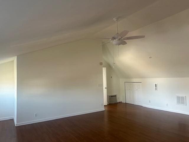 additional living space with a ceiling fan, lofted ceiling, visible vents, and baseboards