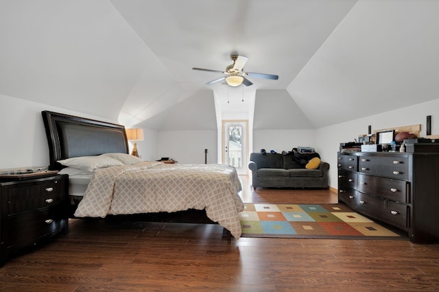 bedroom featuring a ceiling fan, vaulted ceiling, and dark wood finished floors