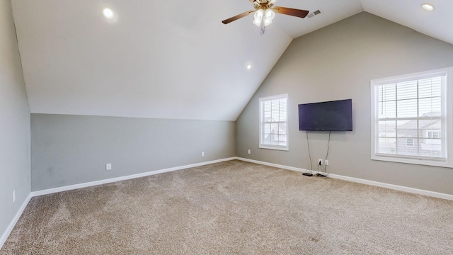 additional living space with lofted ceiling, carpet, and baseboards