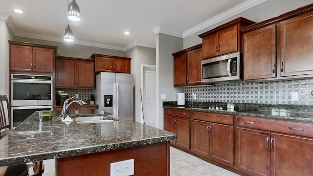 kitchen featuring marble finish floor, a center island with sink, stainless steel appliances, a sink, and dark stone countertops