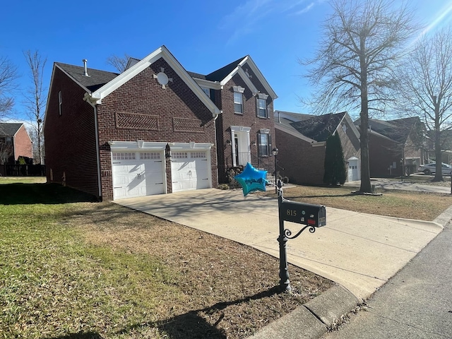 view of front of home featuring driveway, an attached garage, a front lawn, and brick siding