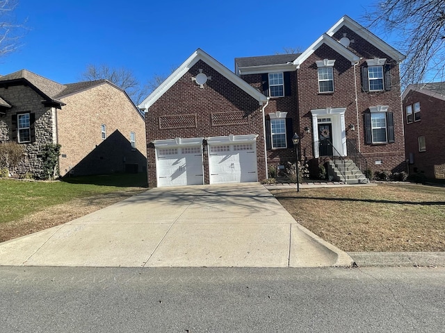 view of front of property with an attached garage, concrete driveway, and brick siding