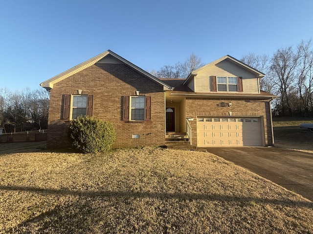 view of front facade featuring concrete driveway, brick siding, crawl space, and an attached garage