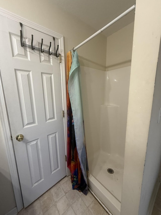 full bath featuring a stall shower