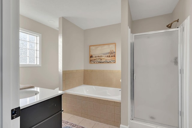 bathroom featuring vanity, tile patterned flooring, a shower stall, and a bath