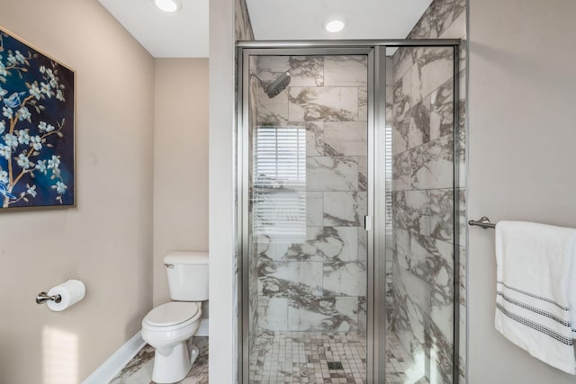 full bathroom with a stall shower, baseboards, toilet, marble finish floor, and recessed lighting