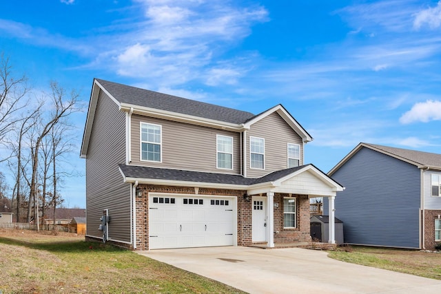 view of front of home with a garage, brick siding, driveway, roof with shingles, and a front yard