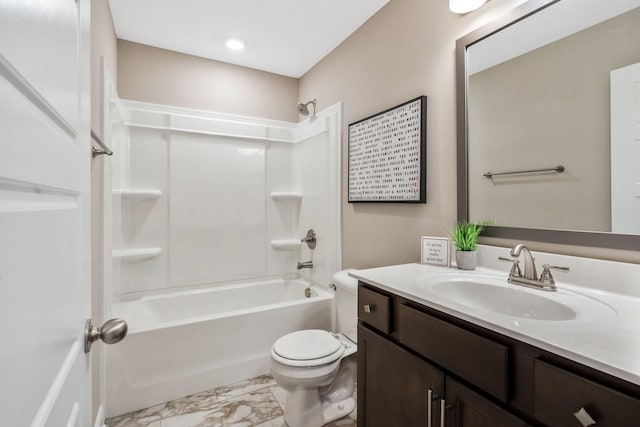 bathroom with washtub / shower combination, marble finish floor, vanity, and toilet