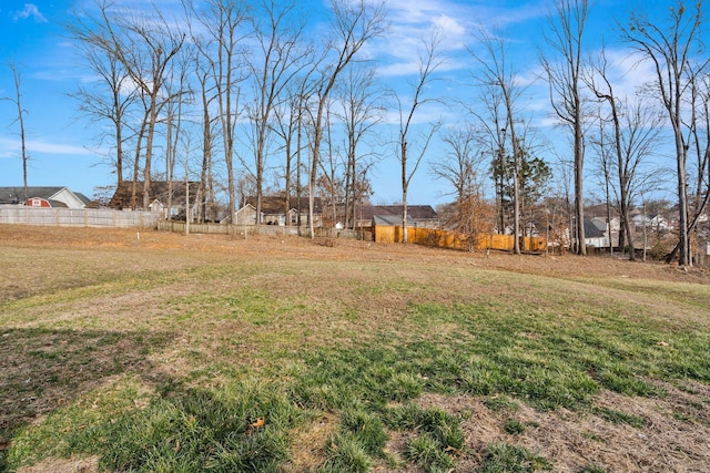 view of yard with fence