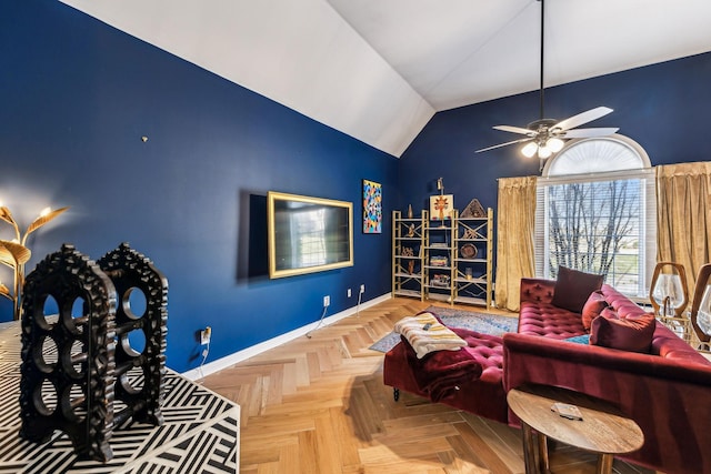 sitting room with vaulted ceiling, ceiling fan, and baseboards