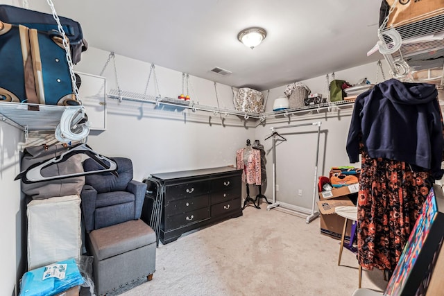 spacious closet featuring visible vents