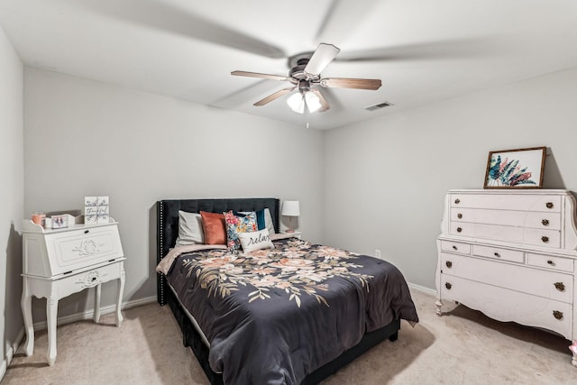 bedroom with a ceiling fan, light colored carpet, visible vents, and baseboards