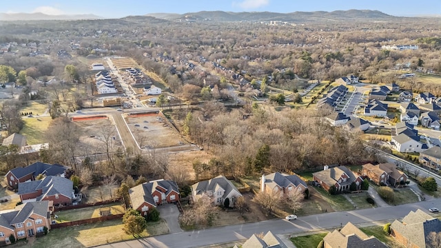 birds eye view of property featuring a residential view and a mountain view