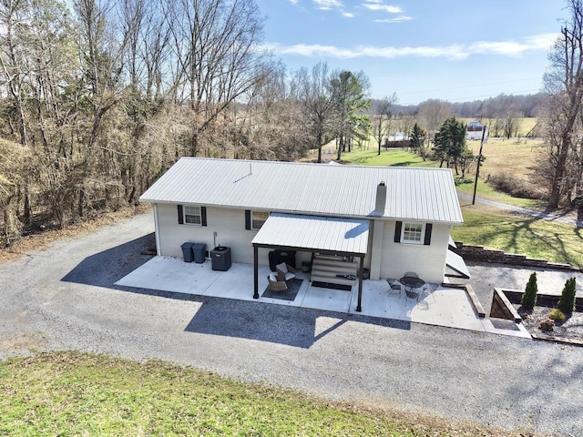 view of front of property with metal roof