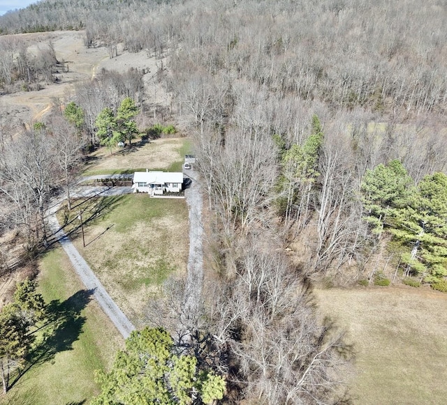 drone / aerial view with a rural view and a wooded view