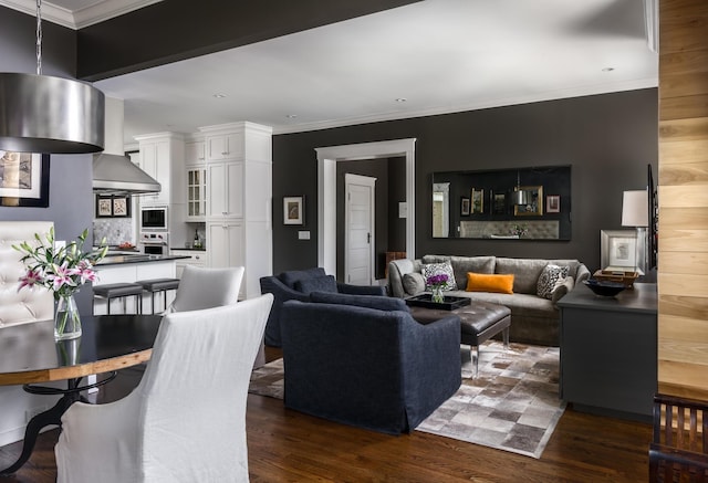 living room featuring ornamental molding and dark wood-type flooring