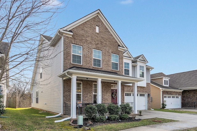 view of front of home featuring brick siding, covered porch, an attached garage, driveway, and a front lawn