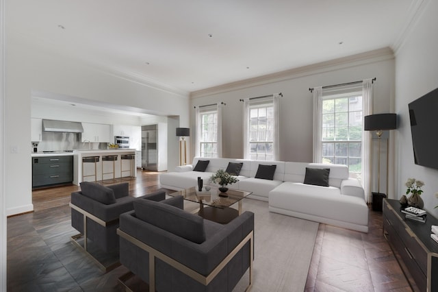 living room with baseboards and crown molding