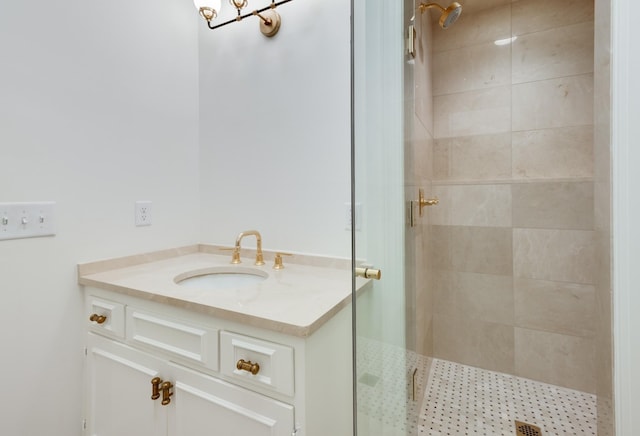 full bathroom with a stall shower and vanity