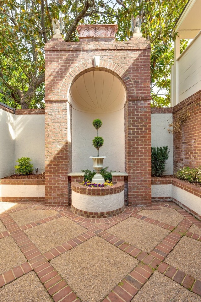 view of patio / terrace featuring fence