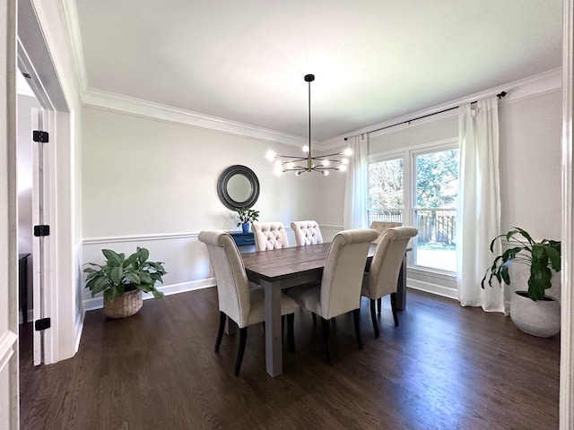 dining room with baseboards, a chandelier, dark wood-style flooring, and crown molding