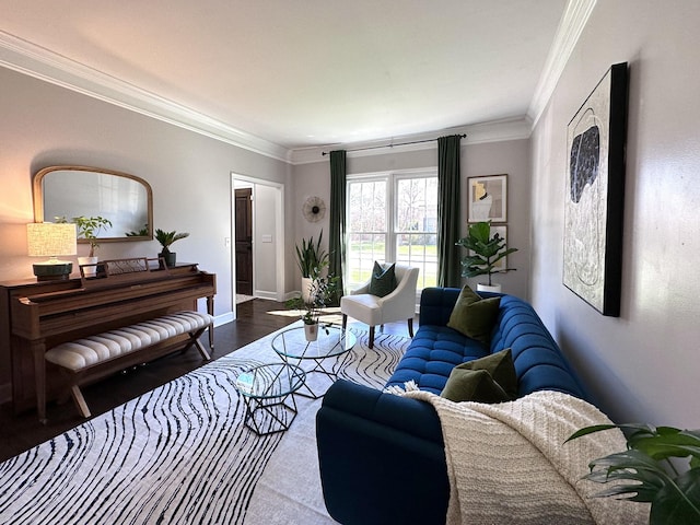 living area with baseboards, dark wood finished floors, and crown molding