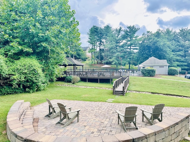 view of patio with an outdoor fire pit