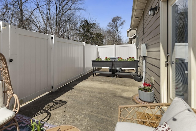 view of patio featuring a fenced backyard