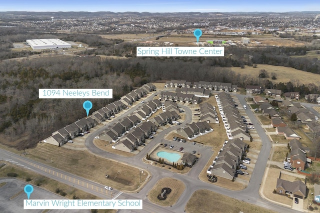 birds eye view of property with a residential view