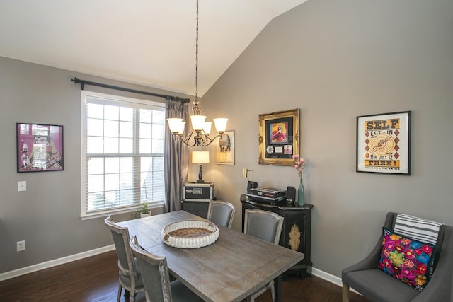 dining space featuring an inviting chandelier, baseboards, vaulted ceiling, and dark wood-type flooring