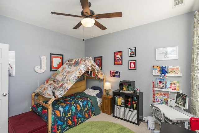 bedroom featuring carpet floors, visible vents, and ceiling fan