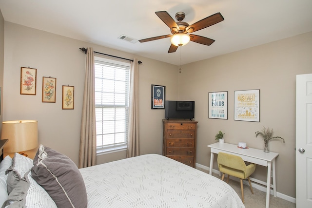 bedroom featuring a ceiling fan, carpet, visible vents, and baseboards