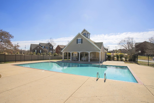 view of pool featuring a patio, fence, and a fenced in pool