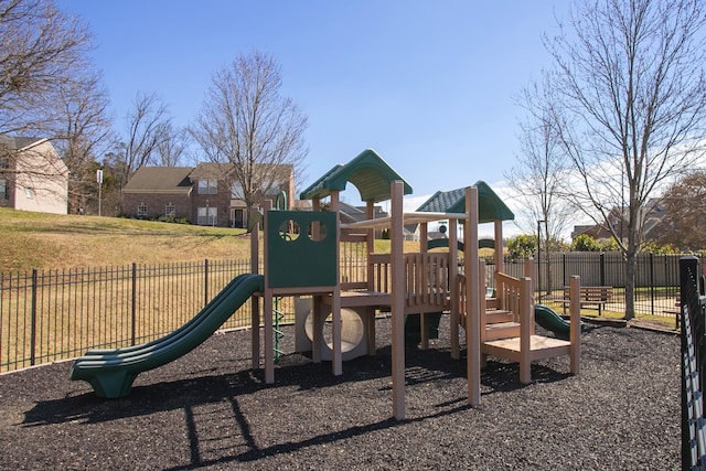 community jungle gym with fence