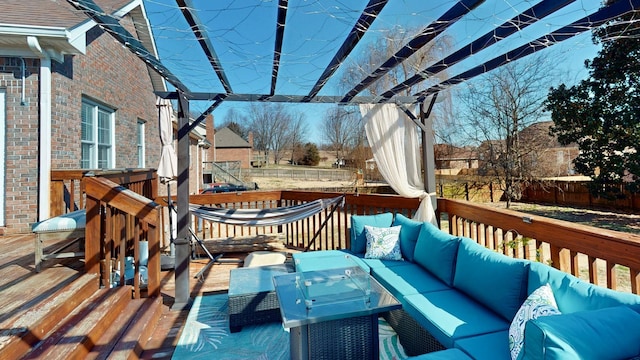 deck featuring outdoor lounge area and fence