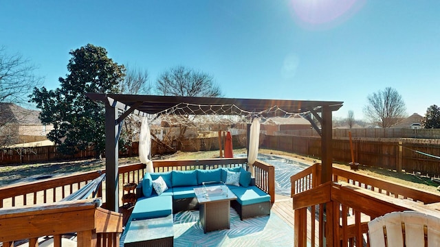 wooden terrace with a pergola, a fenced backyard, and an outdoor hangout area