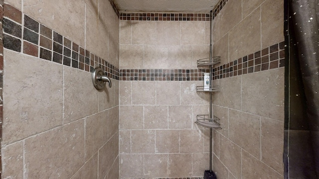 details featuring a tile shower