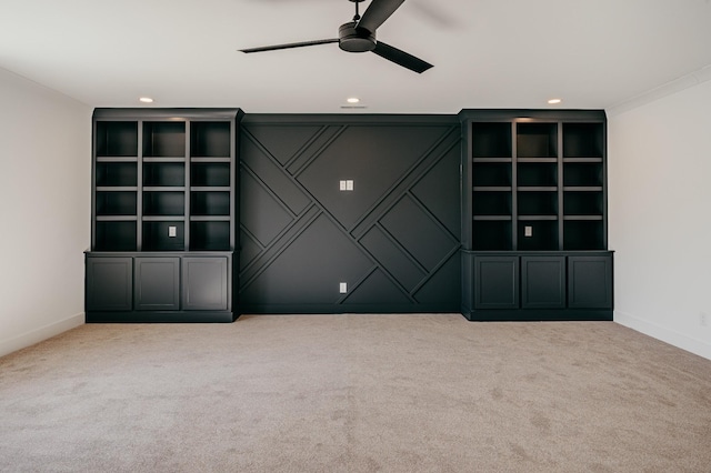 interior space with built in features, recessed lighting, ceiling fan, and baseboards