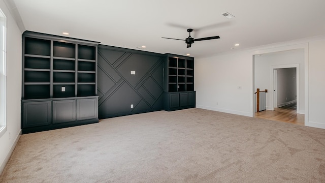 carpeted spare room featuring built in shelves, recessed lighting, visible vents, and ceiling fan