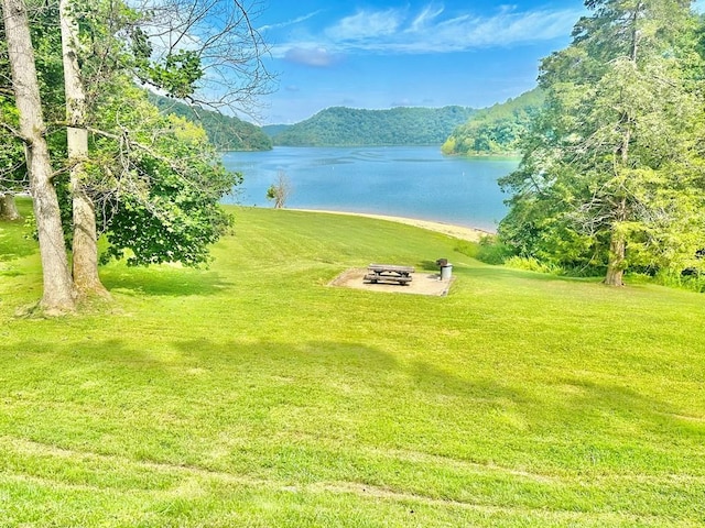 view of water feature featuring a fire pit