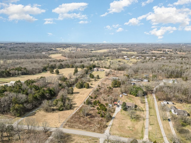 birds eye view of property featuring a rural view