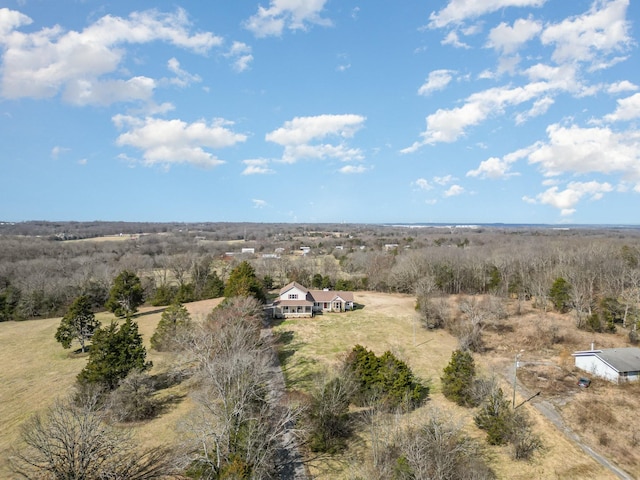 birds eye view of property with a rural view