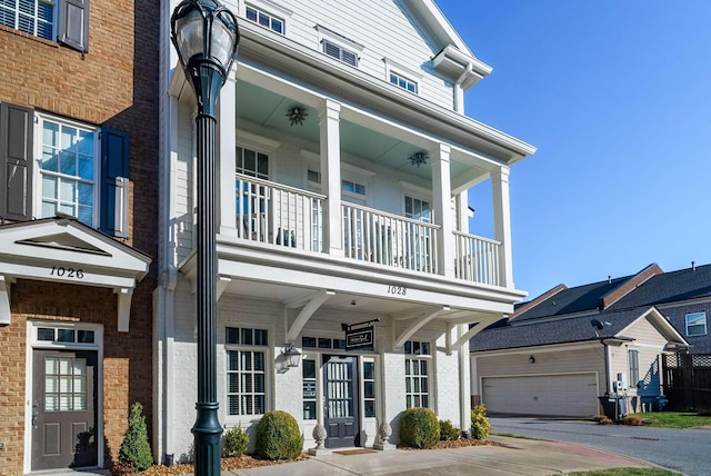 view of front facade with a balcony