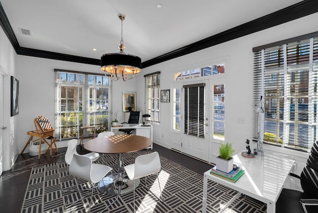 dining room featuring crown molding, dark wood-style flooring, a notable chandelier, and baseboards