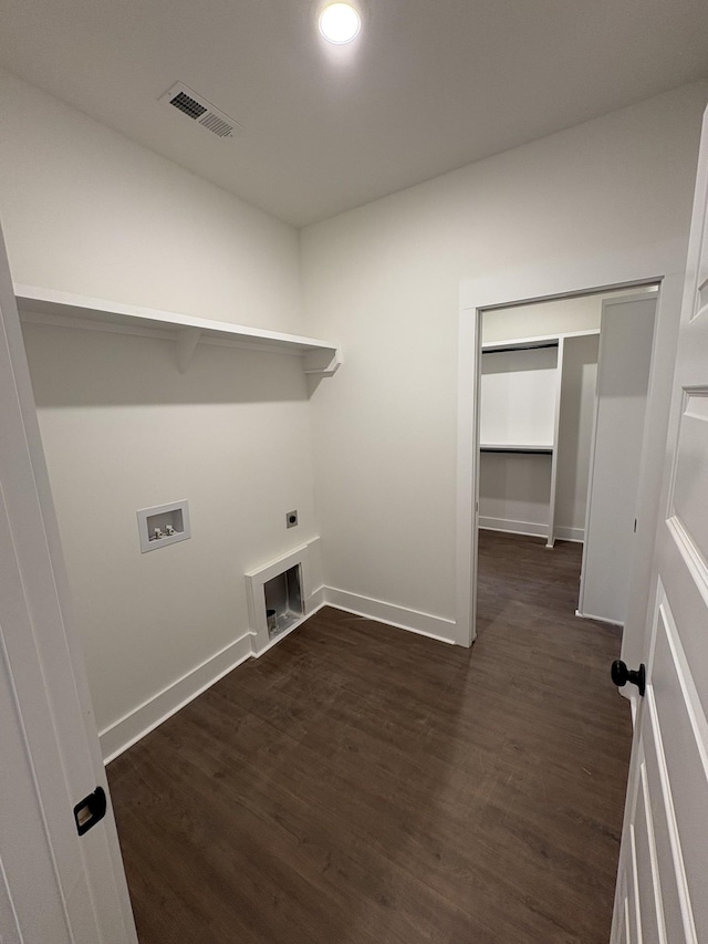 laundry room with dark wood-style floors, laundry area, washer hookup, and visible vents