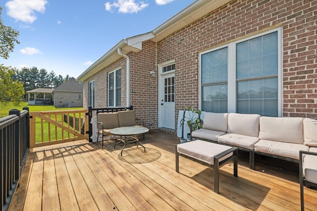 wooden deck featuring an outdoor living space