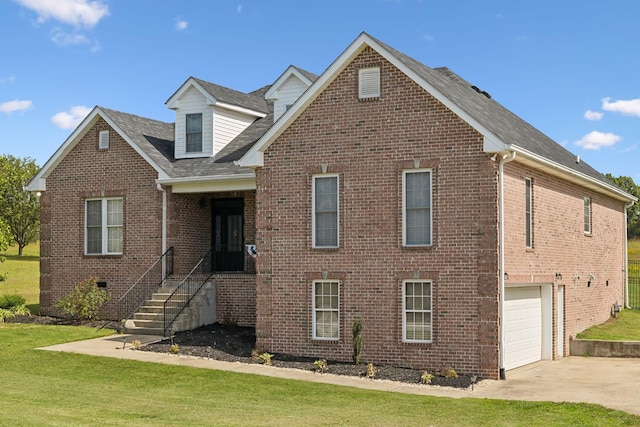 view of front of property with driveway, a garage, crawl space, a front yard, and brick siding