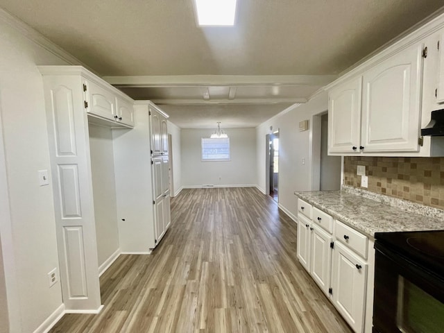 kitchen with baseboards, white cabinets, black / electric stove, light wood-type flooring, and backsplash