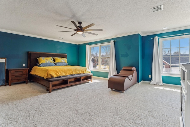 bedroom featuring carpet, multiple windows, visible vents, and crown molding