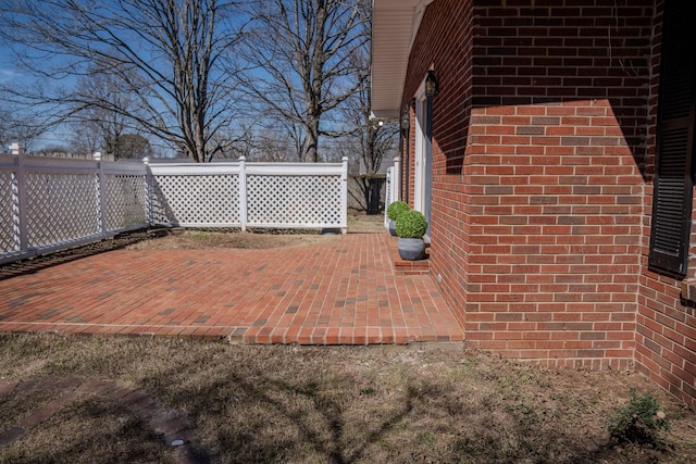 view of patio / terrace with fence